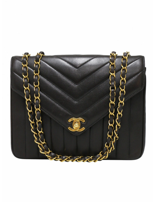 Sac noir Chanel motif chevron vintage