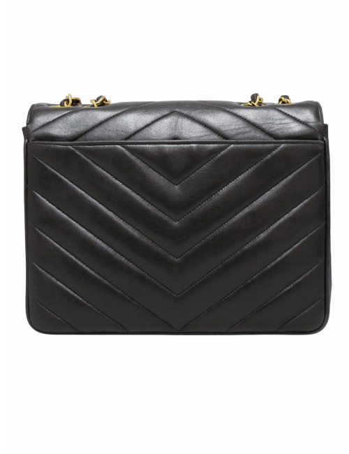 Sac noir Chanel motif chevron vintage