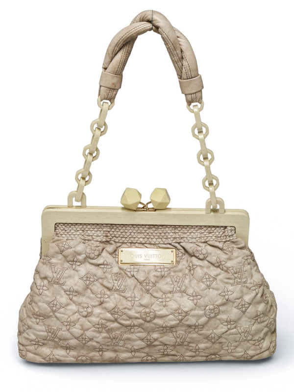 Sac Olympe Louis Vuitton Série limitée cuir embossé