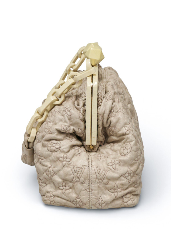 Sac Olympe Louis Vuitton Série limitée cuir embossé