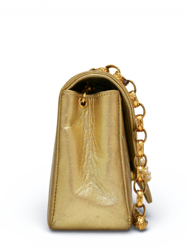 Sac du soir Chanel cuir doré chevrons