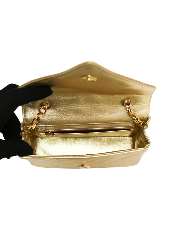 Sac du soir Chanel cuir doré chevrons