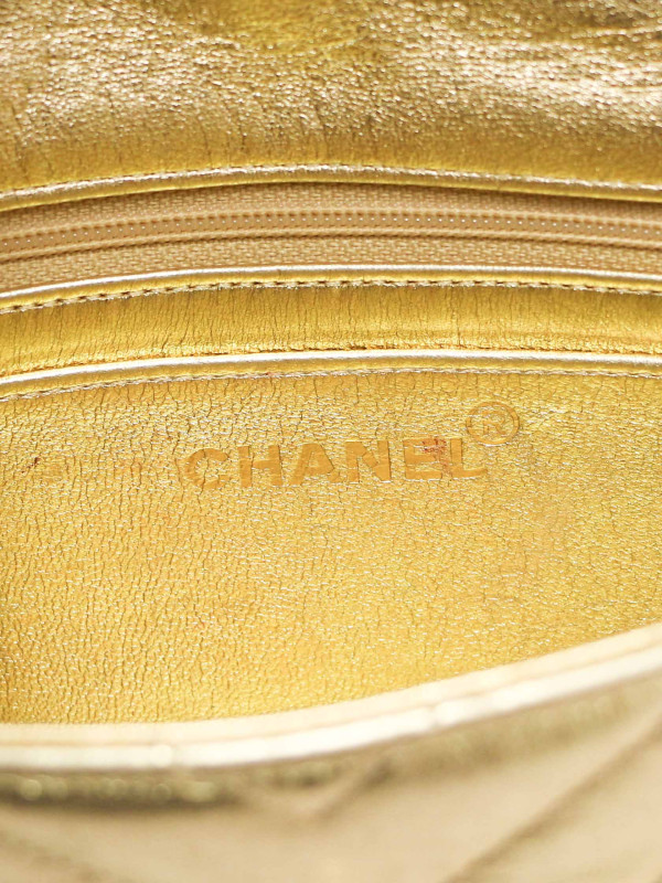Sac du soir Chanel cuir doré chevrons