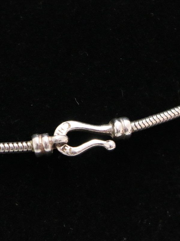 Collier Chanel Mademoiselle argent Vintage