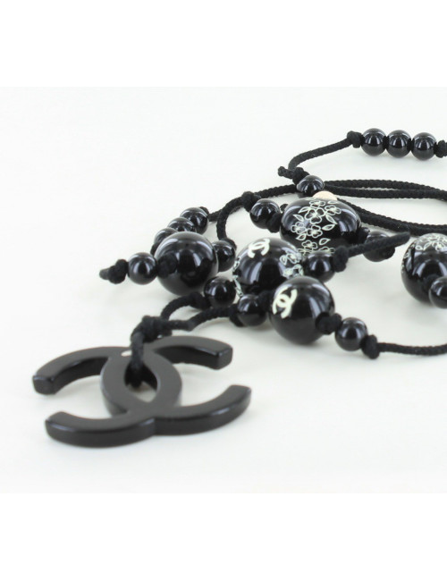 sautoir CHANEL perles noires sur cordon