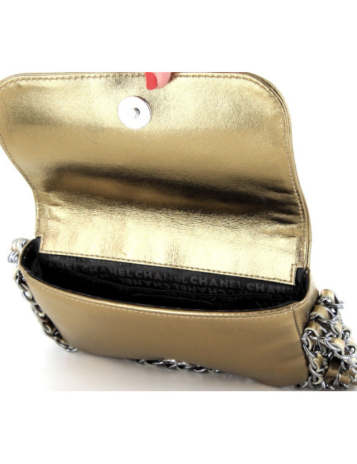 Small CHANEL flap bag in Bronze gilded leather