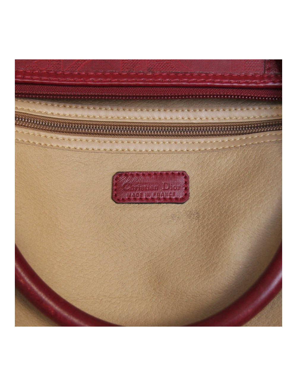 Sac de voyage DIOR en toile embossée rouge