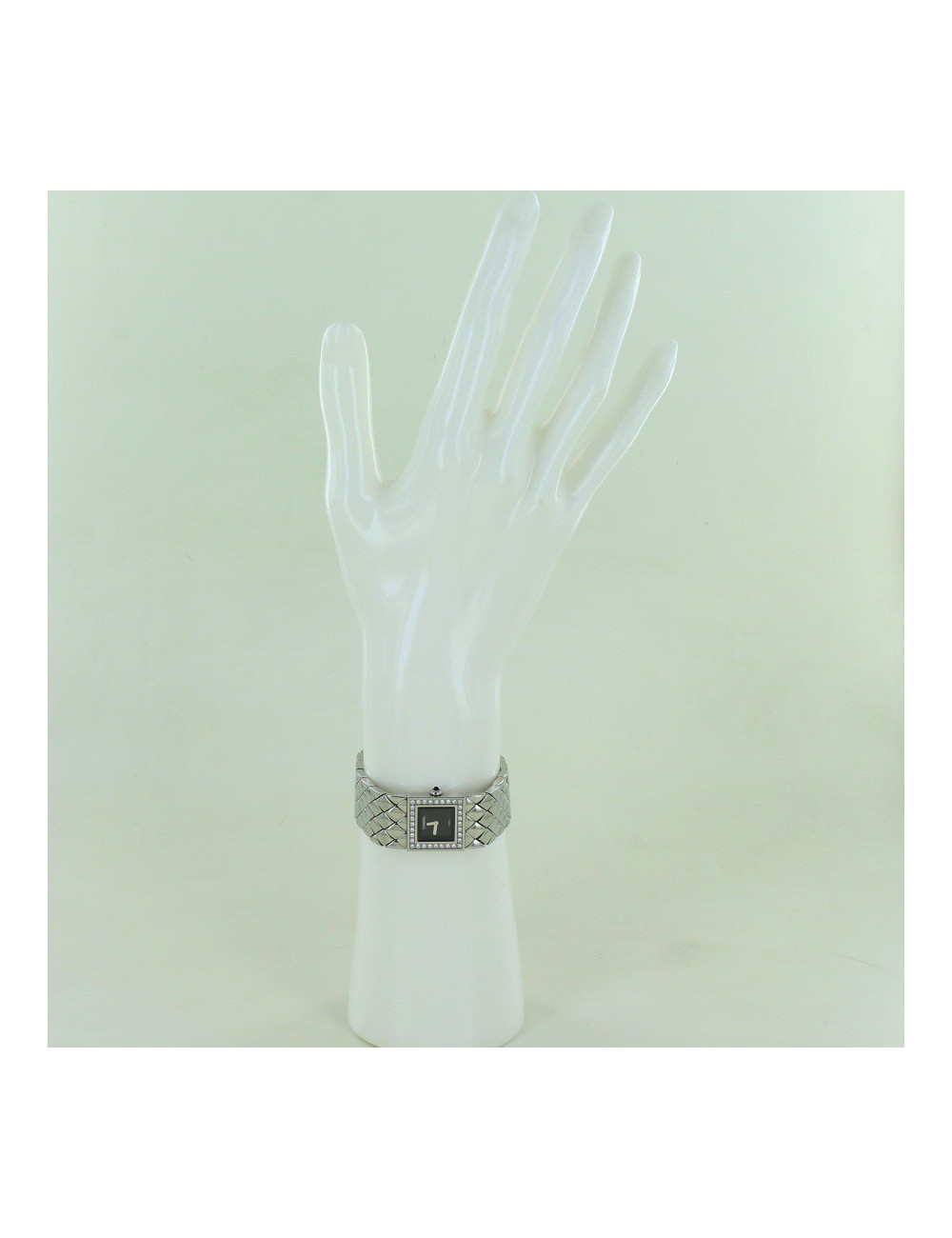 Montre matelassée CHANEL acier et brillants