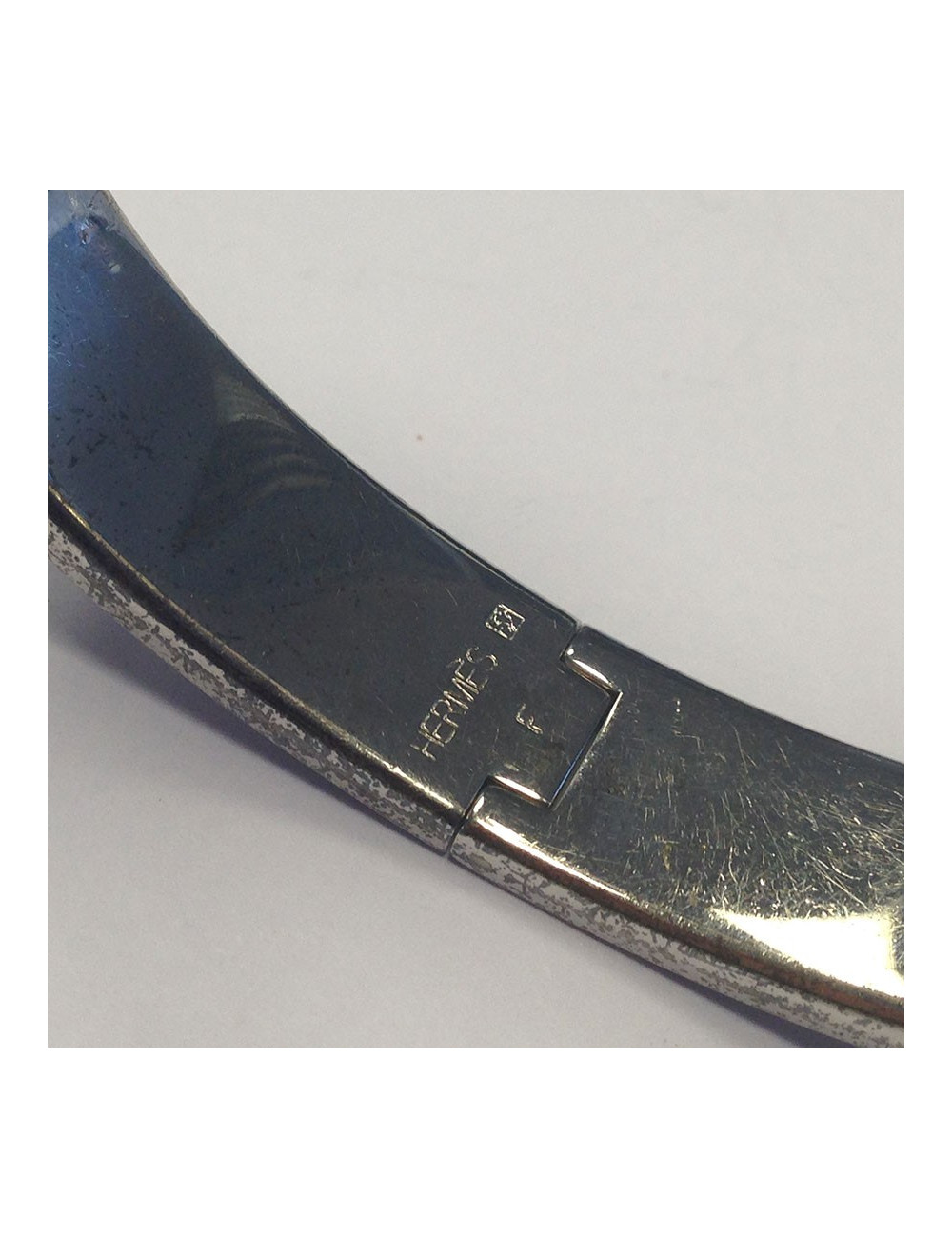 Bracelet "Clic H" HERMES métal argenté et noir