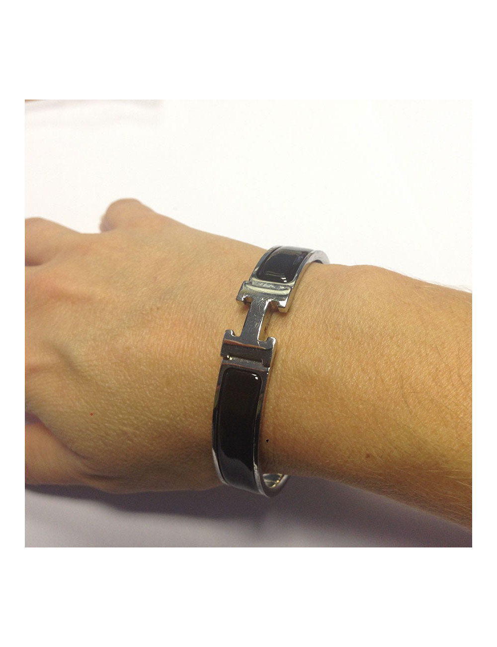 Bracelet "H" HERMES métal argenté