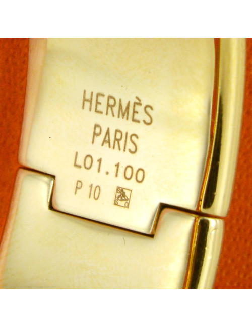 Montre Loquet HERMES  serpent rouge dorée