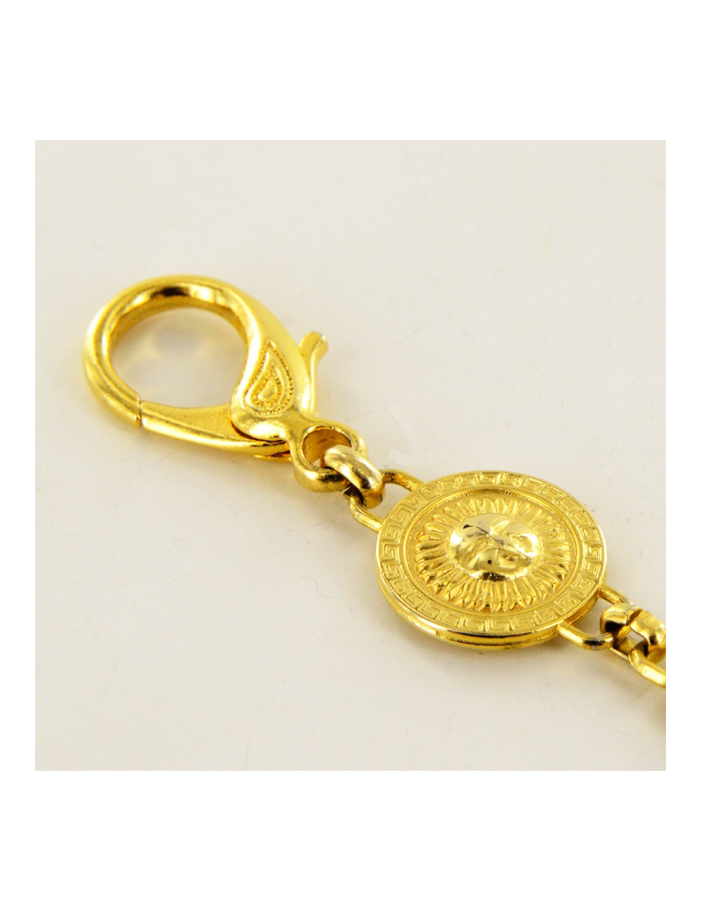 Bijou de sac VERSACE doré