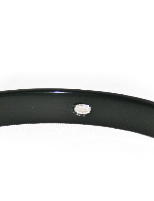 Bracelet CHANEL pléxi noir et clous argentés