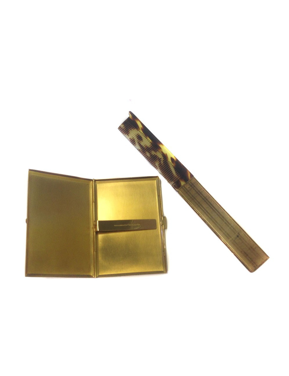 Door-mini cigarettes and his CHRISTIAN DIOR metal comb gold