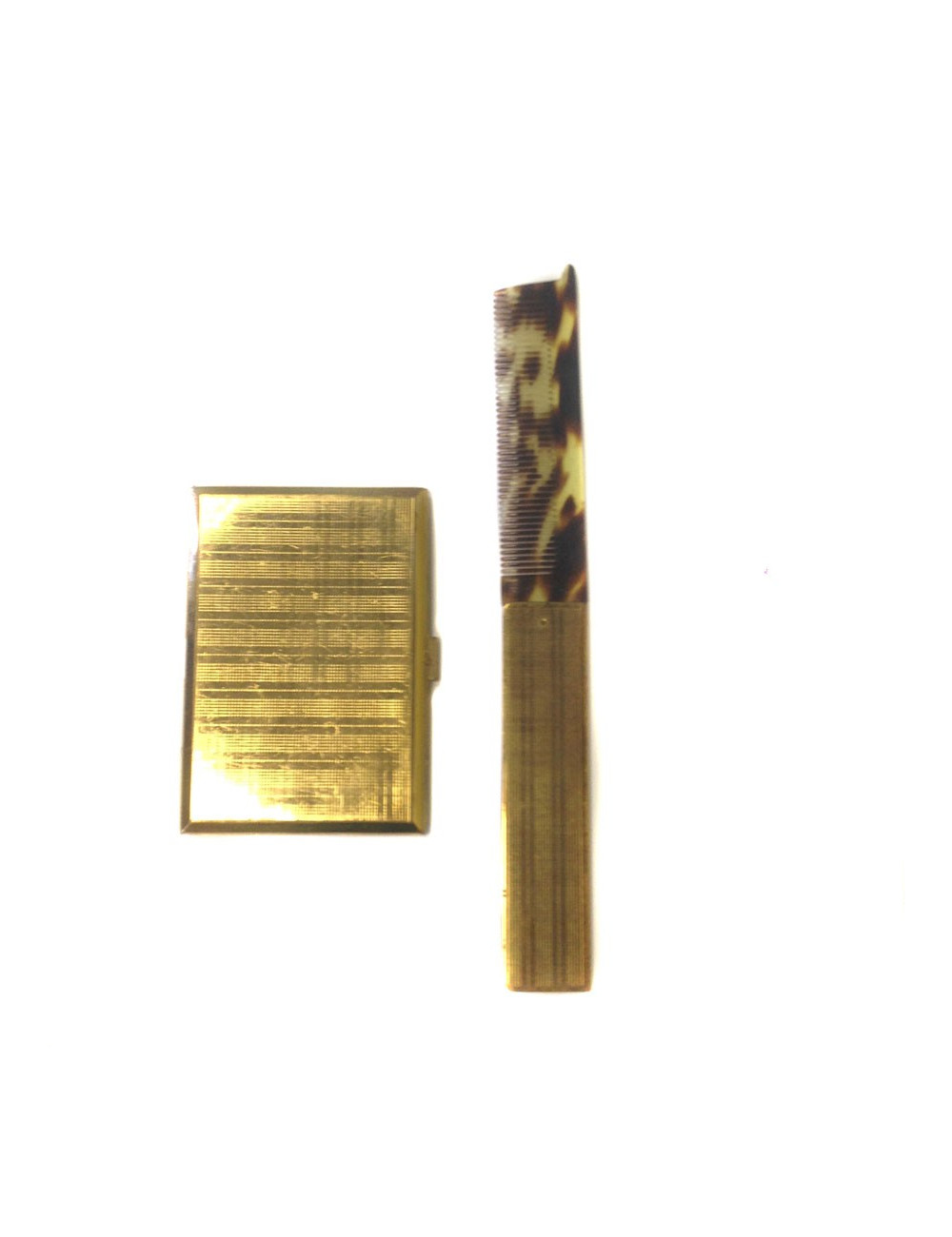 Door-mini cigarettes and his CHRISTIAN DIOR metal comb gold