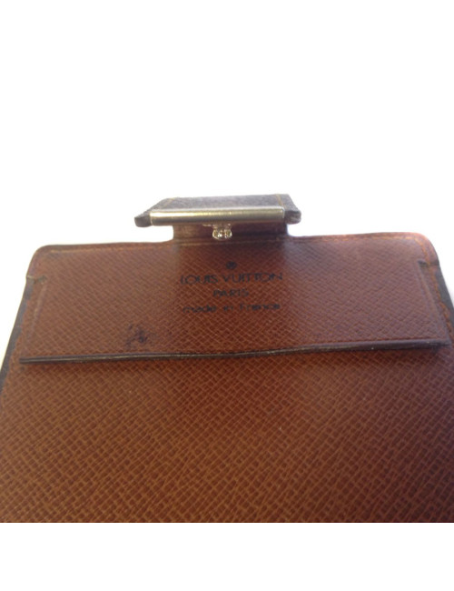 Porte chéquier LOUIS VUITTON en toile enduite monogrammée et cuir