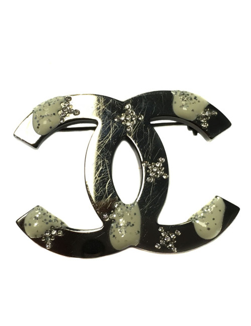 Broche CHANEL CC en métal argenté et strass