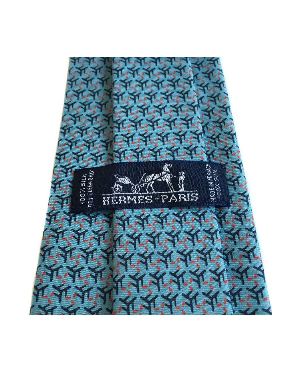 Cravate HERMES en twill de soie bleu clair, bleu foncé et rouge