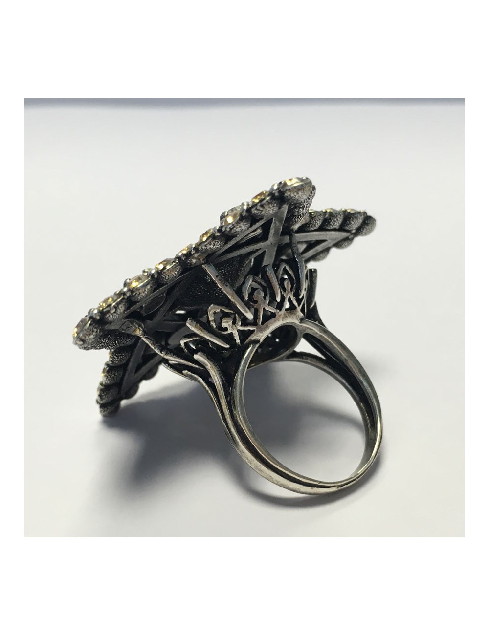 Bague LANVIN T55 étoile en métal argenté et strass blanc et or