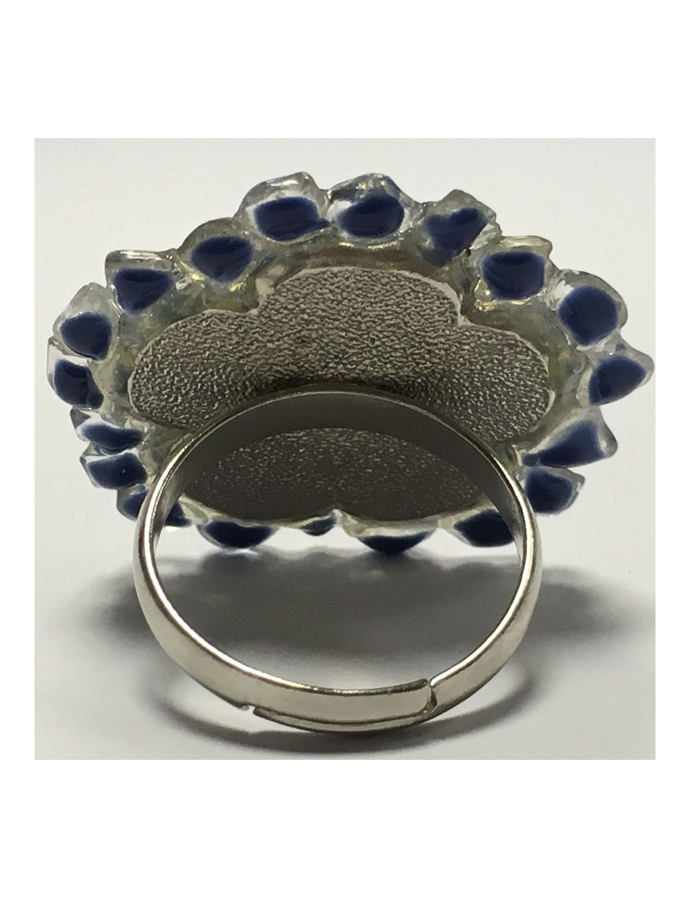 Bague CHANEL haute couture T 52 argentée, strass et résine bleue