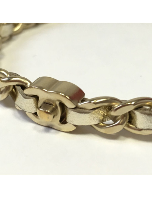 Bracelet CHANEL en métal doré entrelacé de cuir