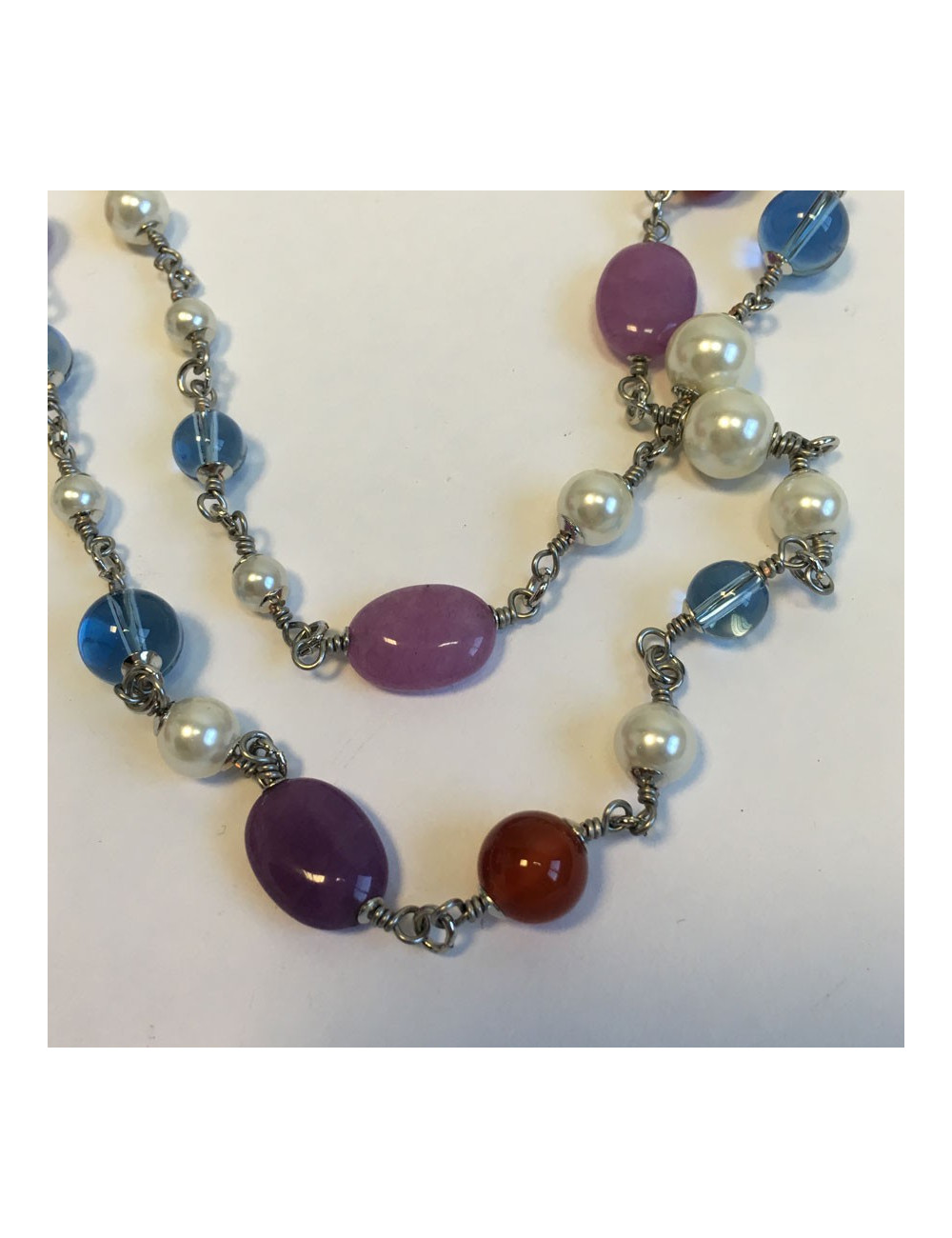 CHANEL necklace in multicolored pearls and CC