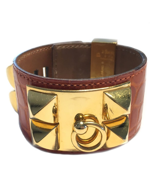 Manchette Médor HERMES en crocodile orange et bijouterie dorée