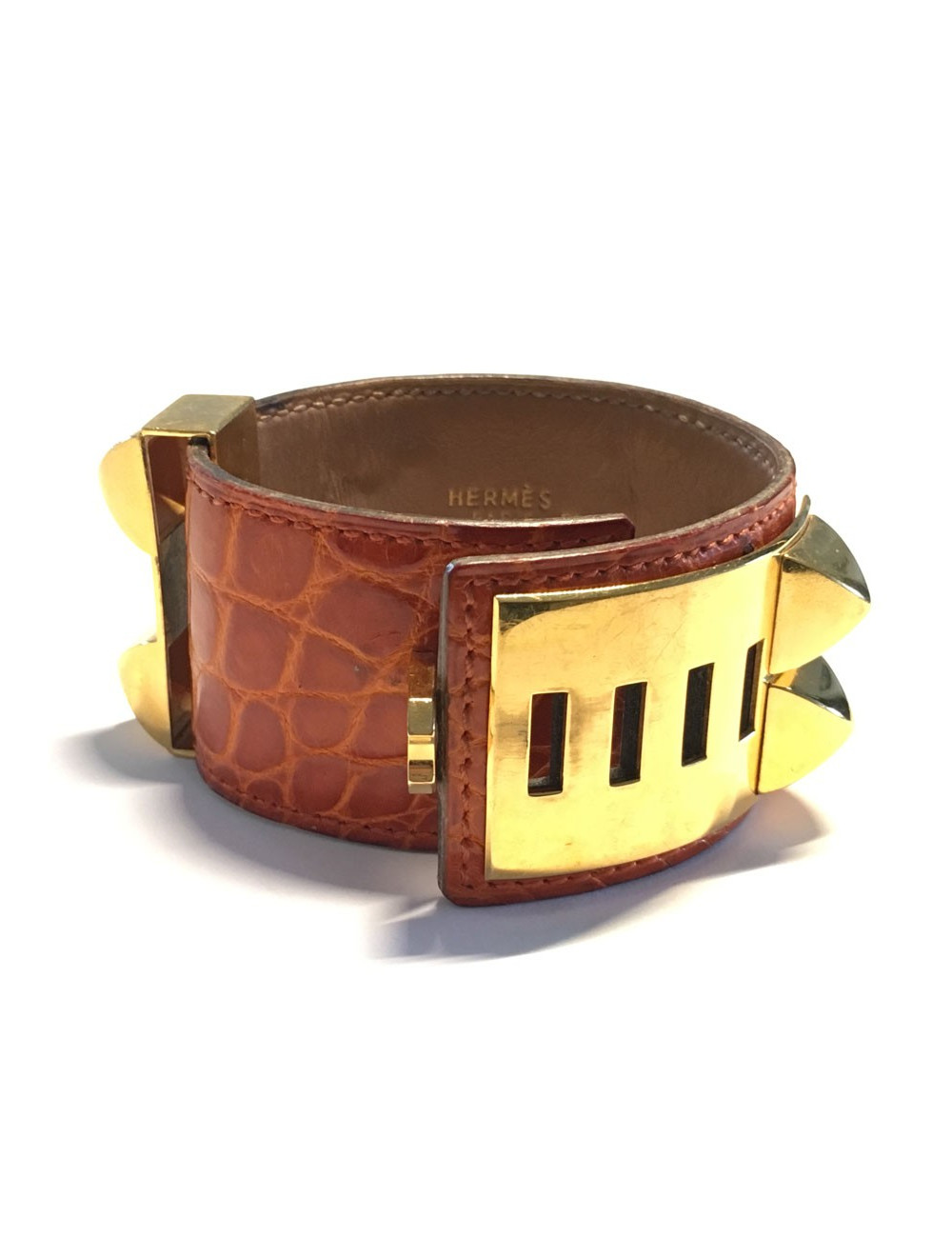 HERMES Medor cuff in orange leather and gold hardware