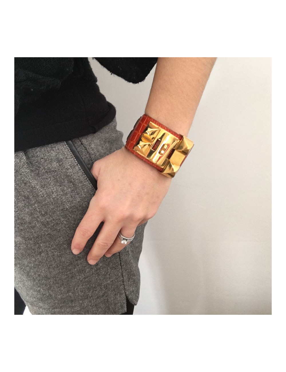 HERMES Medor cuff in orange leather and gold hardware