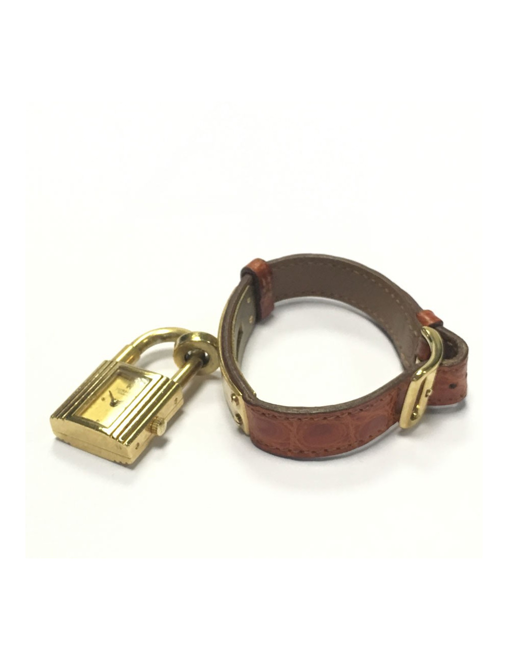 HERMES Kelly watch with ora,ge crocodile bracelet and gilded hardware