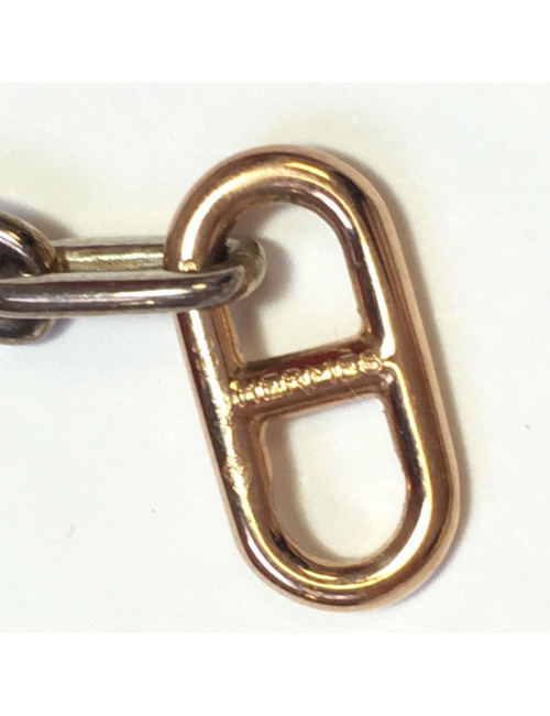 Boucles d'oreille clous HERMES pendants en or et argent