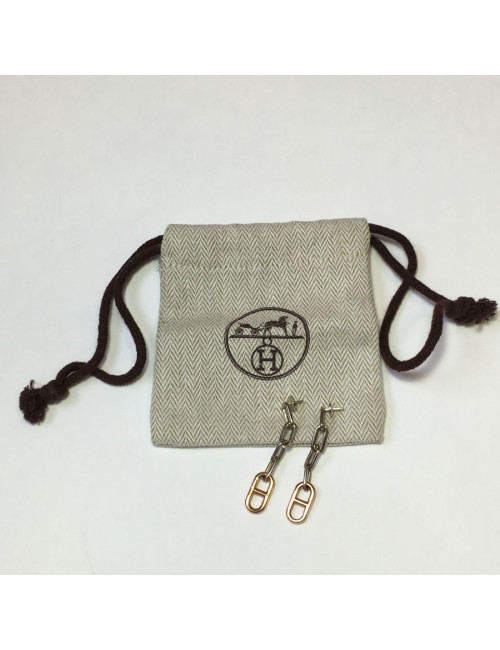 Boucles d'oreille clous HERMES pendants en or et argent