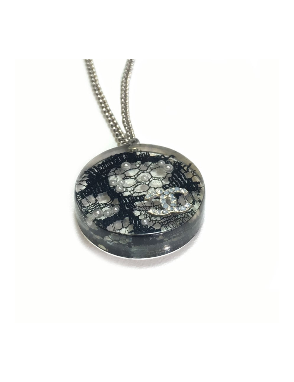 CHANEL necklace in plexi with inclusion of lace and beads