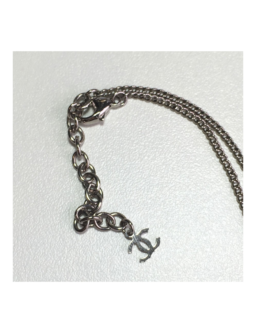 CHANEL necklace in plexi with inclusion of lace and beads