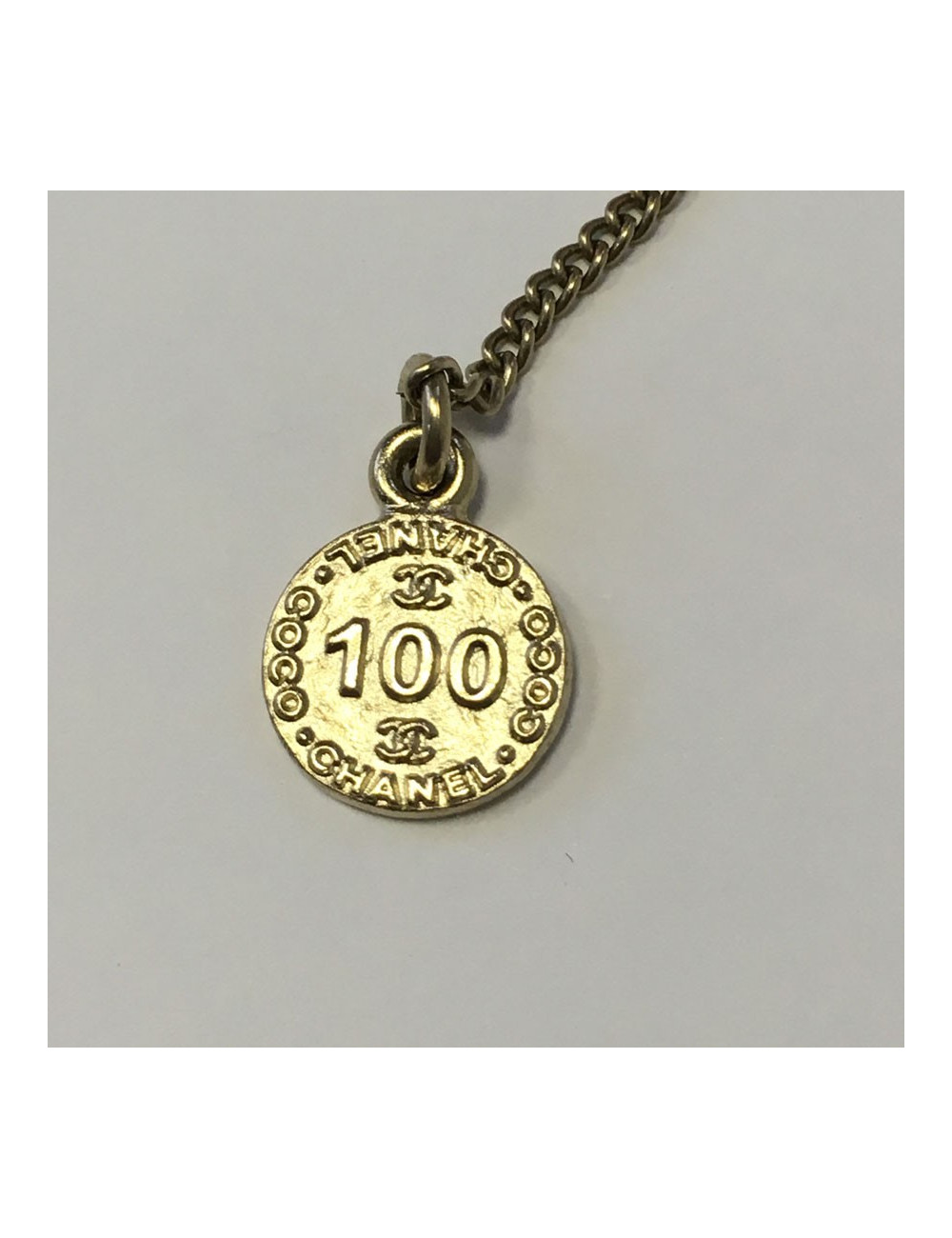 xxx Collier CHANEL camélia en pâte de verre pailleté