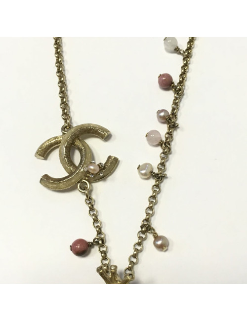  Collier CHANEL en métal doré et pendentif fleur