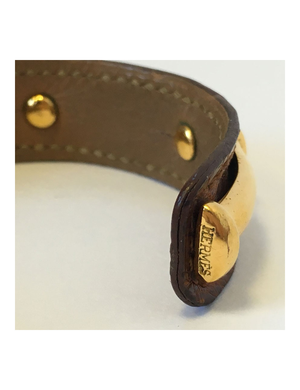 HERMES brown leather bracelet and gold bamboo