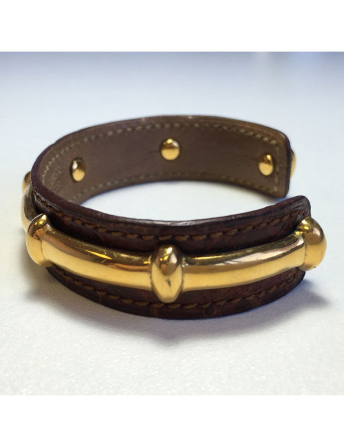 HERMES brown leather bracelet and gold bamboo