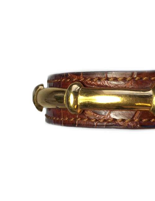 HERMES brown leather bracelet and gold bamboo