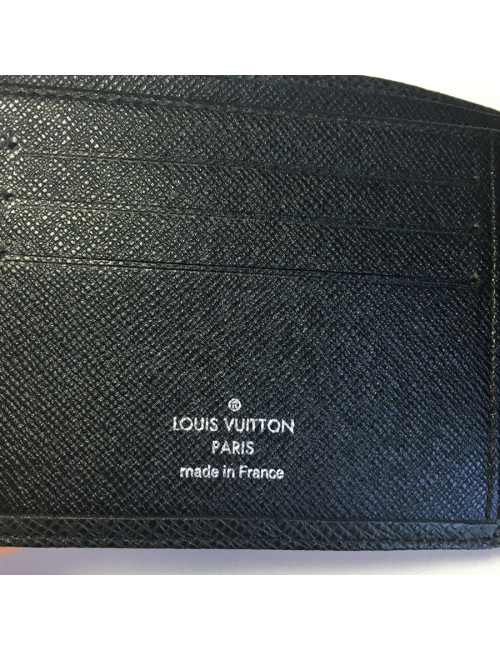 Multiple LOUIS VUITTON taiga leather wallet