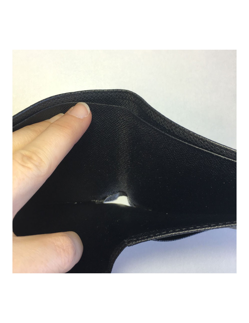 Multiple LOUIS VUITTON taiga leather wallet