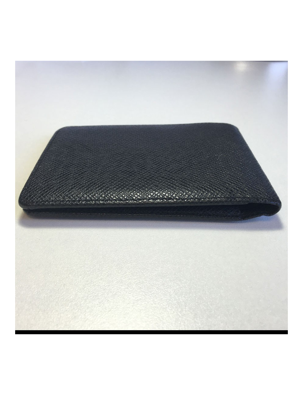Multiple LOUIS VUITTON taiga leather wallet