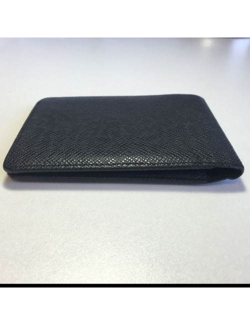 Multiple LOUIS VUITTON taiga leather wallet