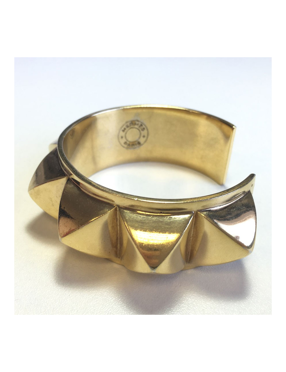HERMES Collier De Chien rigid cuff bracelet in gilded metal