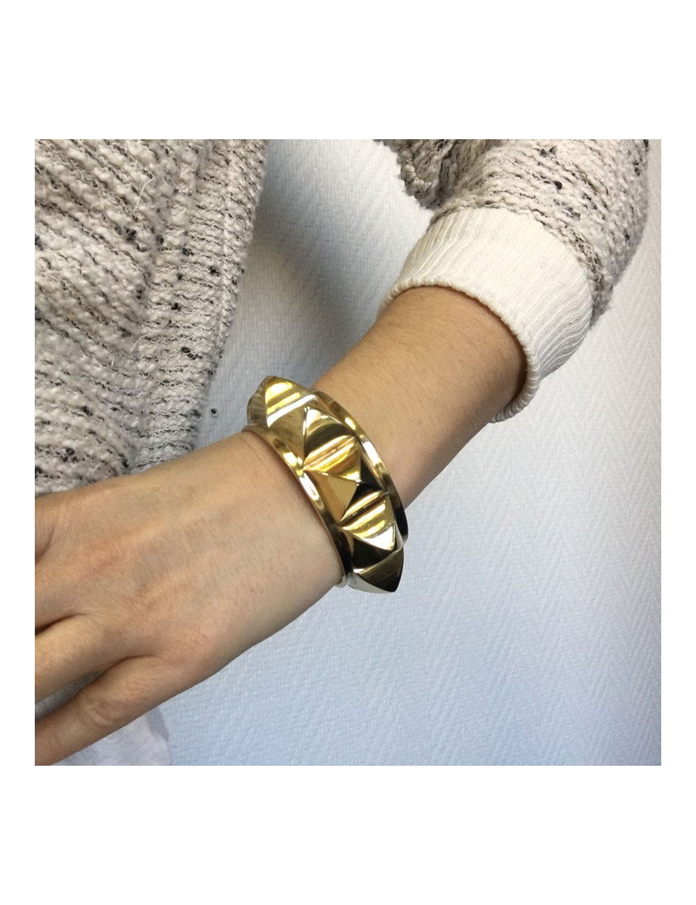 HERMES Collier De Chien rigid cuff bracelet in gilded metal