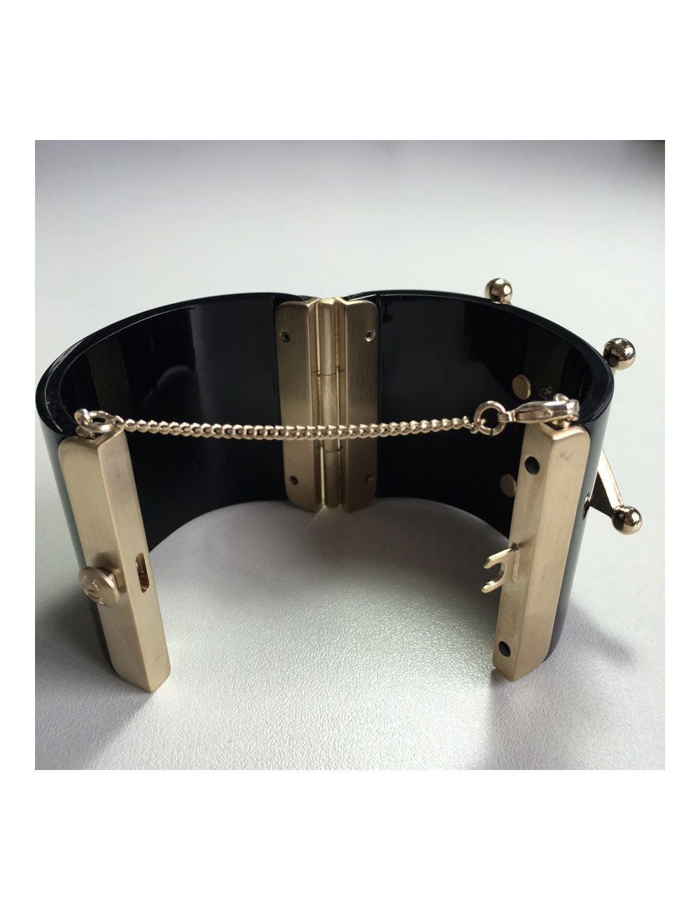 CHANEL "Paris-Dallas" cuff in black resin and jewellery gold metal