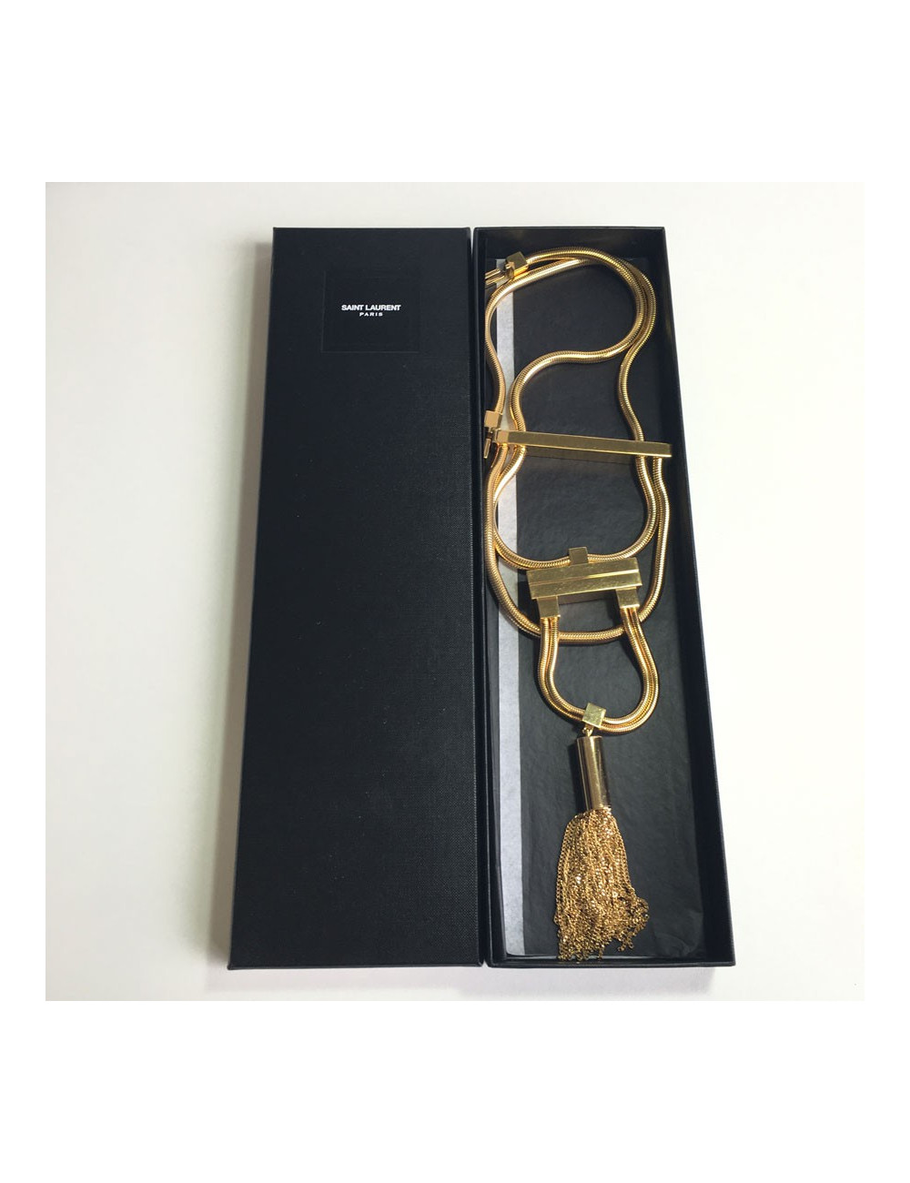 Sautoir YVES SAINT LAURENT en laiton doré