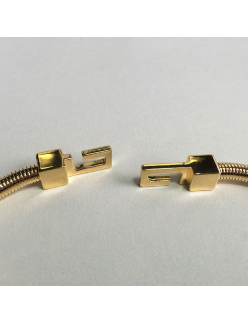 Sautoir YVES SAINT LAURENT en laiton doré