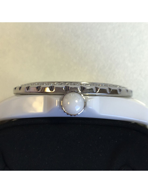 White ceramic CHANEL J12 watch and diamonds