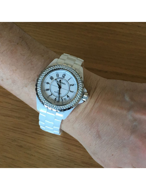 White ceramic CHANEL J12 watch and diamonds